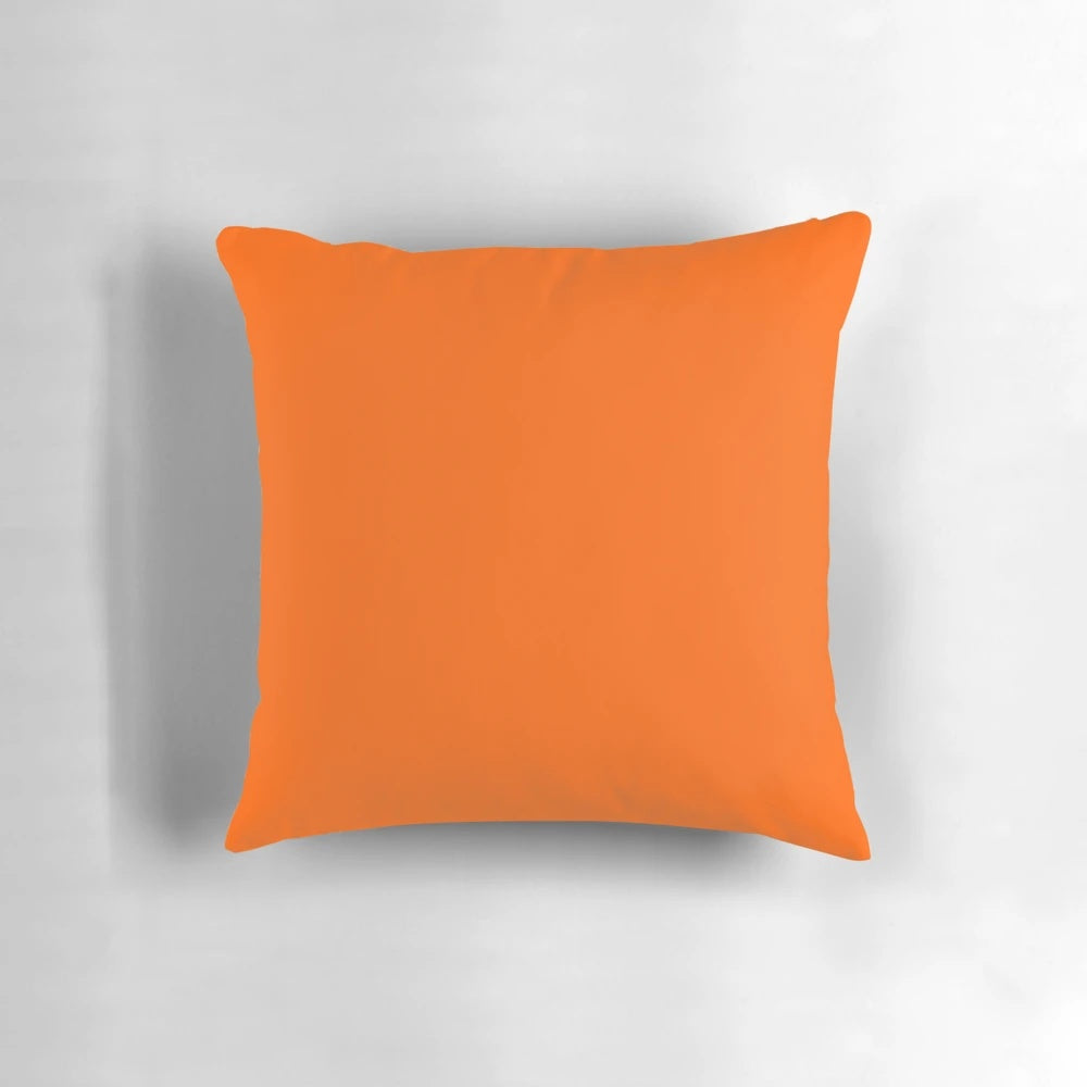 Vivid orange throw pillow with a variety of orange hues