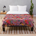 Cozy and vibrant pink and violet galaxy-themed plush blanket