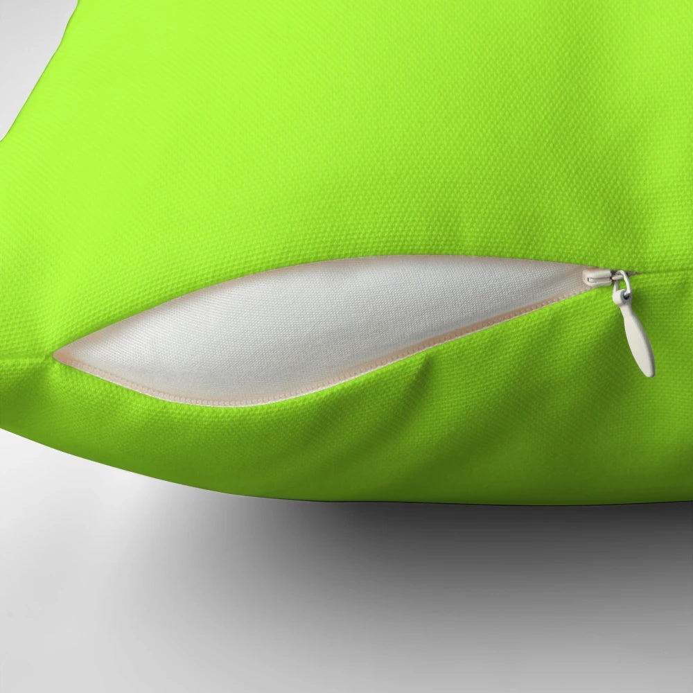 A plain, solid green and yellow pillow with a vibrant, sunny color palette.
