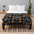 Handcrafted plush blanket featuring traditional Polish wycinanki folk art patterns