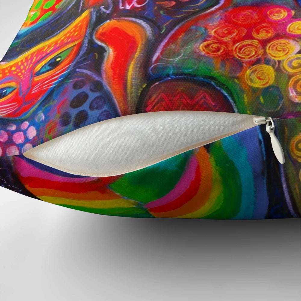 Colorful, psychedelic-inspired illustration of whimsical cats on a decorative pillow