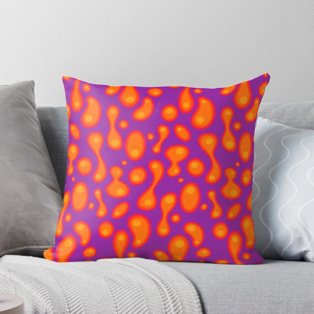 Colorful purple lava lamp inspired pillow with a groovy, retro 70s design