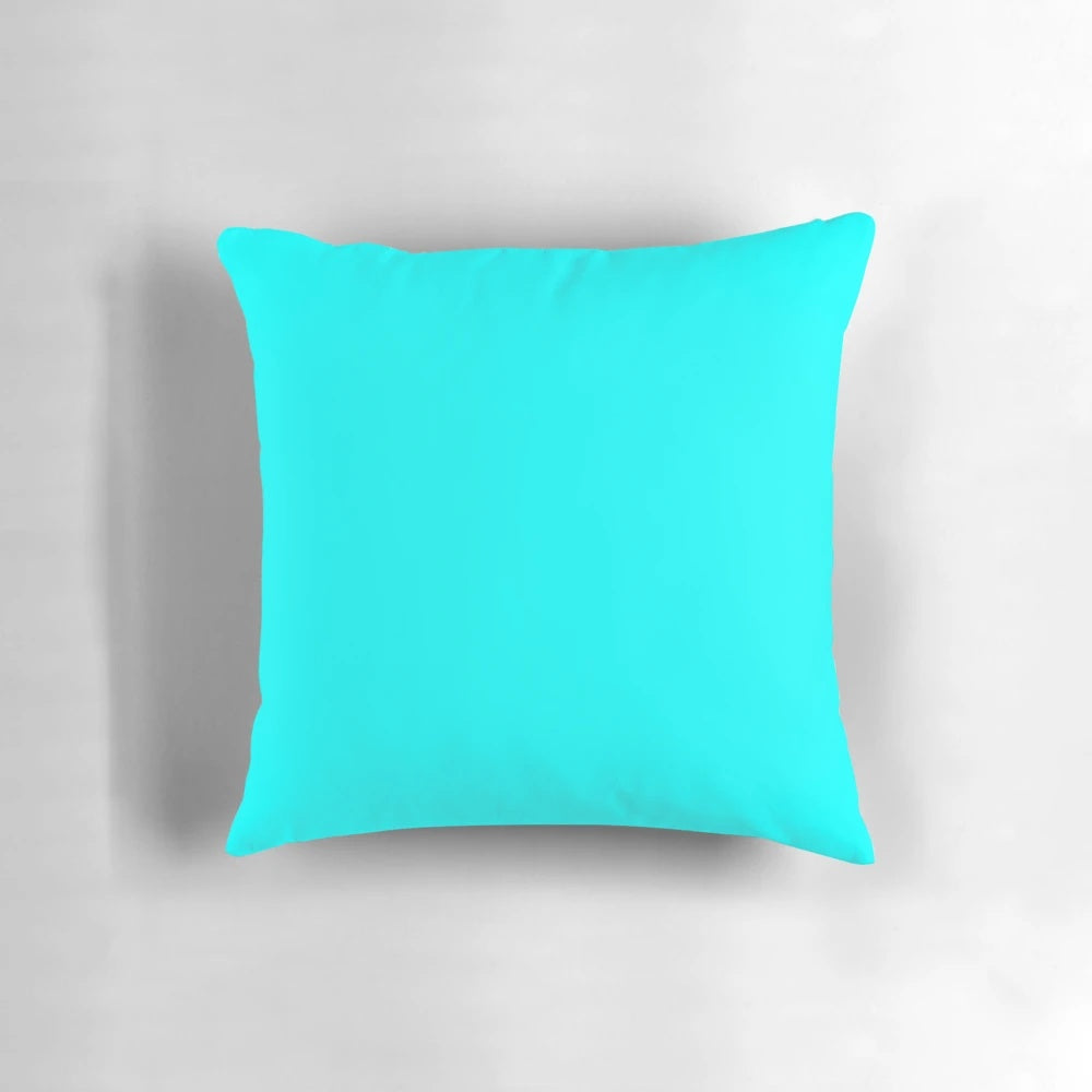 Solid cyan decorative pillow with turquoise and aqua accents, offering a modern and vibrant design for home decor.