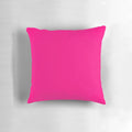 Bright pink decorative pillow with various shades of pink