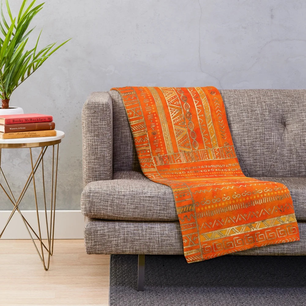 Tribal ethnic geometric pattern gold on orange plush blanket