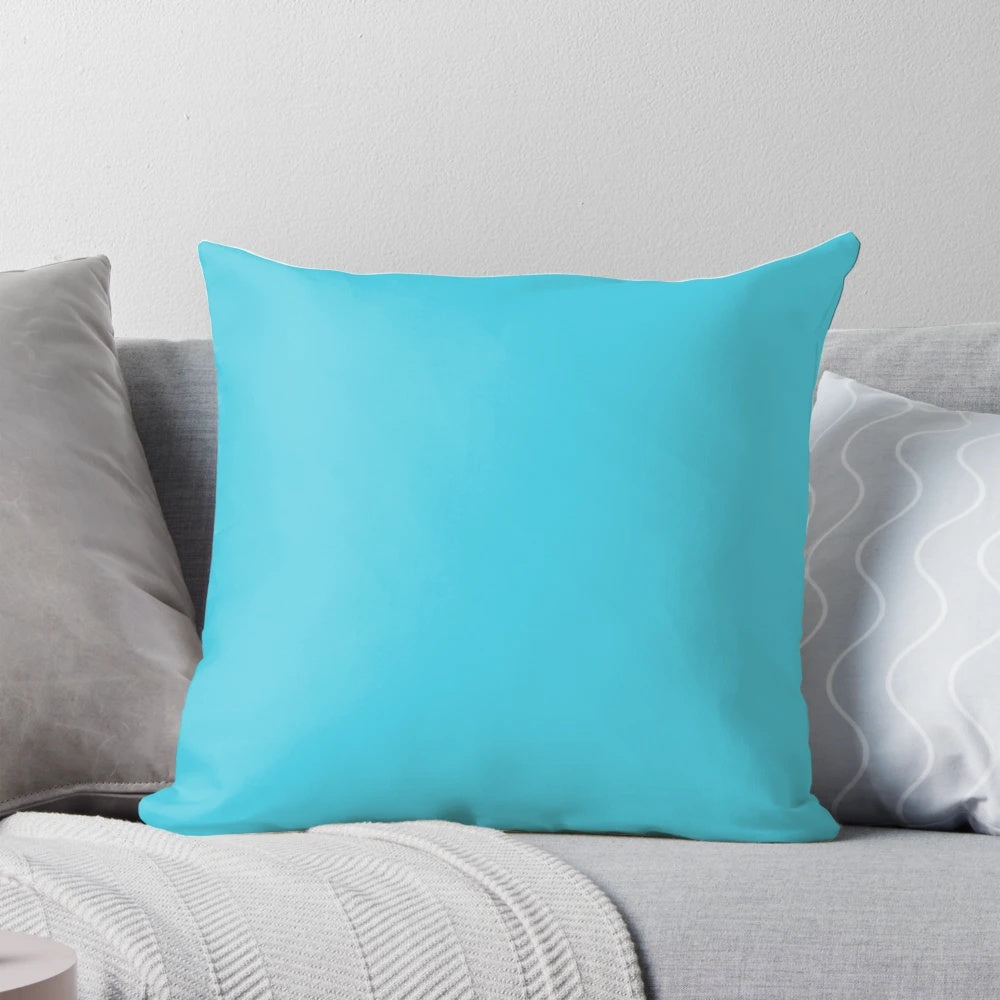 Turquoise pillow with minimalist digital art design