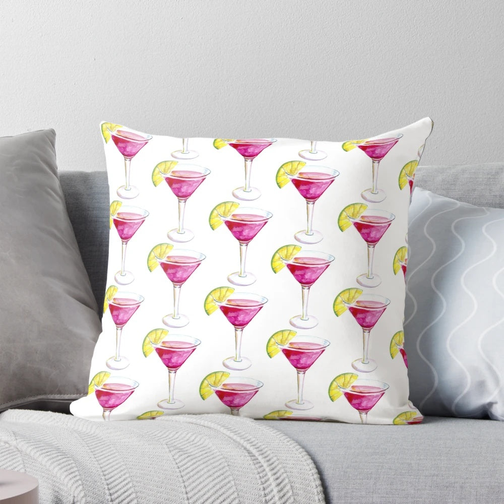 Colorful watercolor painting of a cosmopolitan cocktail on a decorative throw pillow