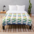 Watercolor illustration of dachshund dogs on a plush, soft blanket
