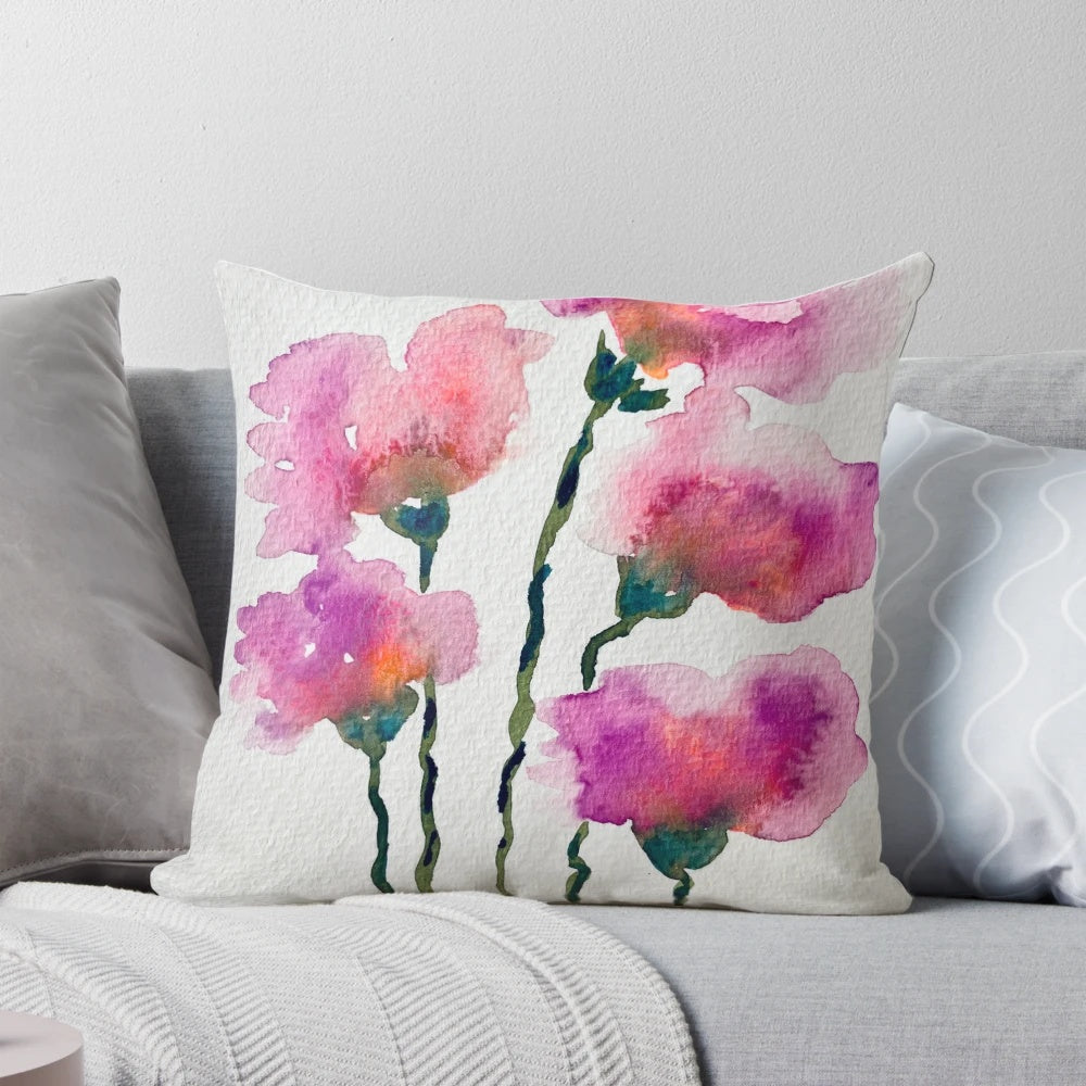 Colorful watercolor floral pattern on a decorative throw pillow