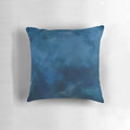 A blue and white abstract watercolor pattern decorative throw pillow.