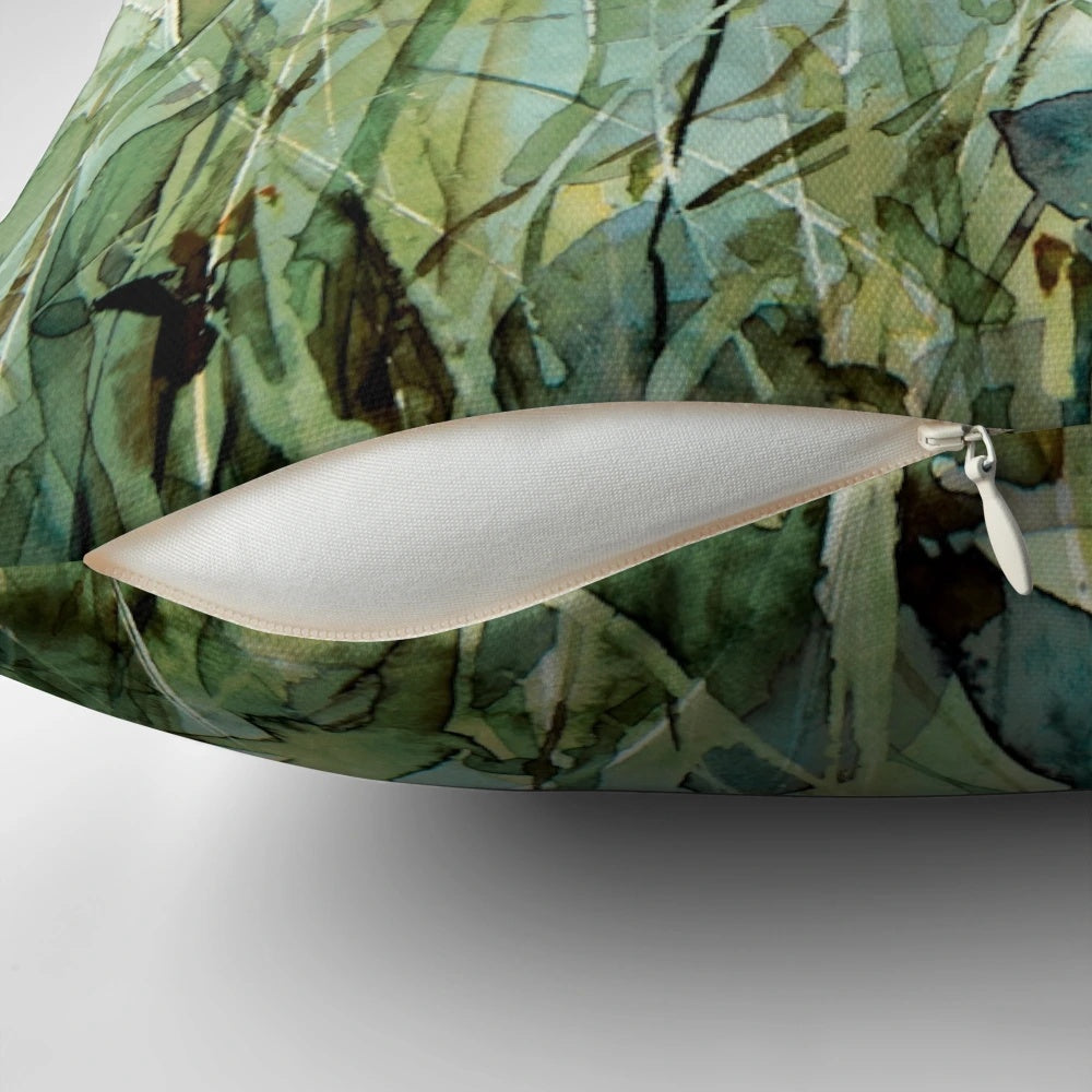 Colorful wild floral throw pillow featuring a watercolor nature design
