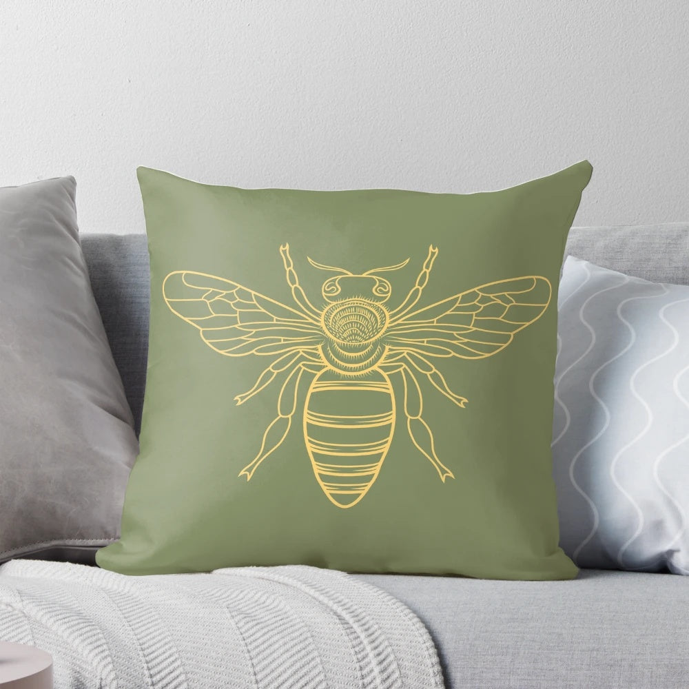 A vibrant yellow pillow with a repeating bee pattern, perfect for adding a touch of nature-inspired charm to your home.