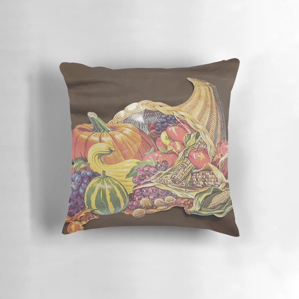 Vintage-inspired autumn cornucopia pillow with fall foliage and decorative elements
