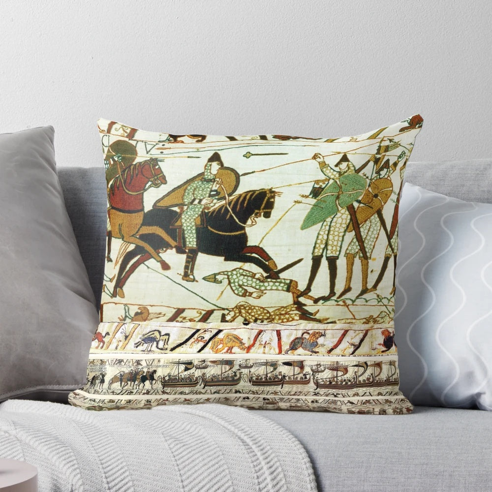 Detailed embroidered pillow depicting the famous Battle of Hastings with Norman knights on horseback.