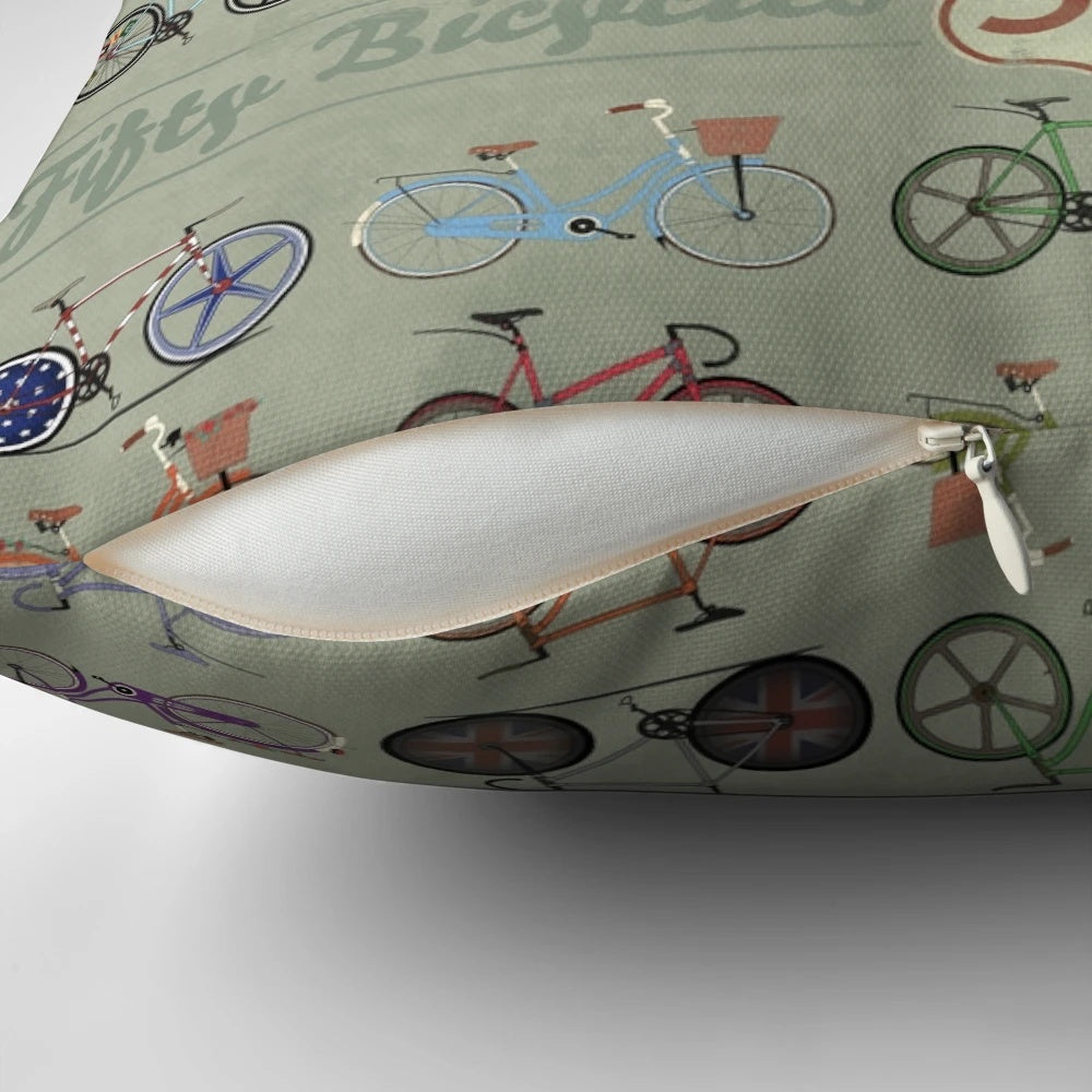 Decorative throw pillow featuring a collage of 50 vintage, retro, and fixed gear bicycles