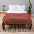 Colorful vintage-inspired plush blanket with distressed 15th century medallion pattern