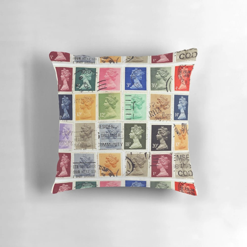 Pillow featuring a vintage British postage stamp design with the profile of Queen Elizabeth