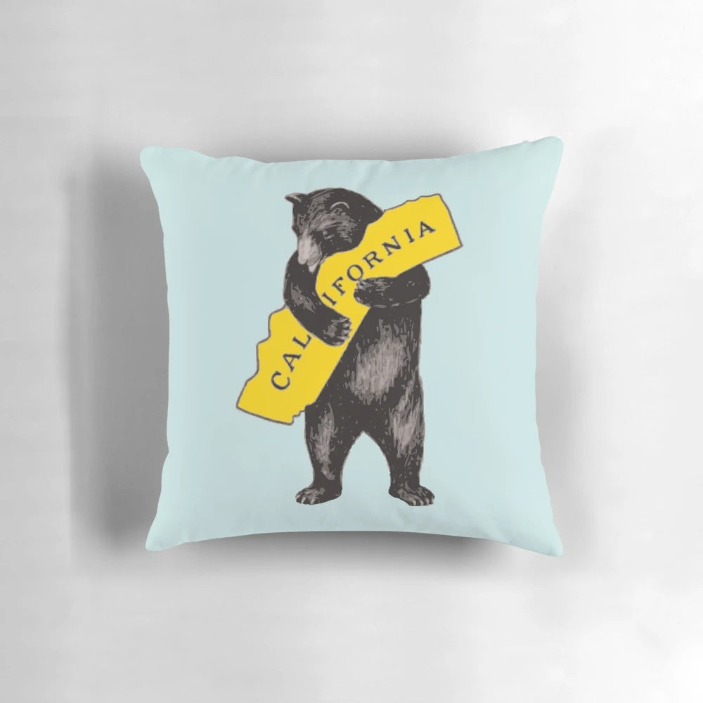 Vintage California bear hug illustration on a soft, plush pillow