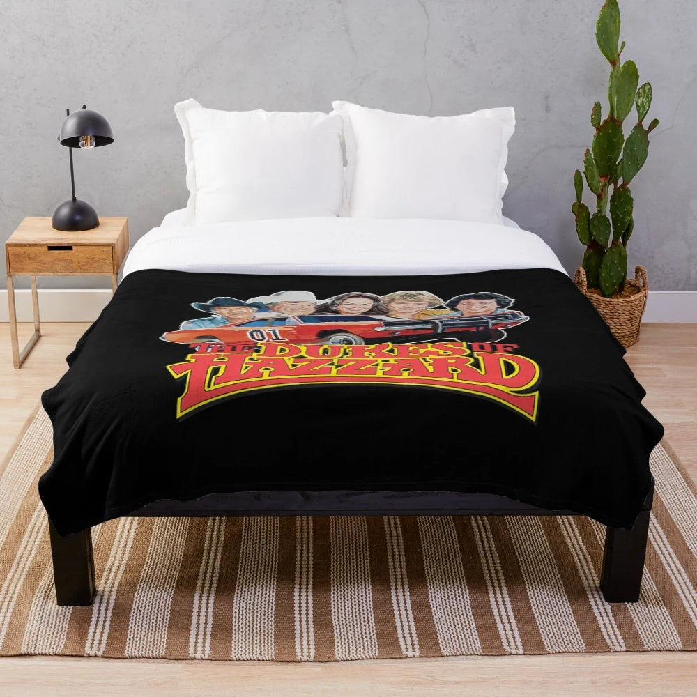 Plush blanket featuring a vintage muscle car and classic rock design