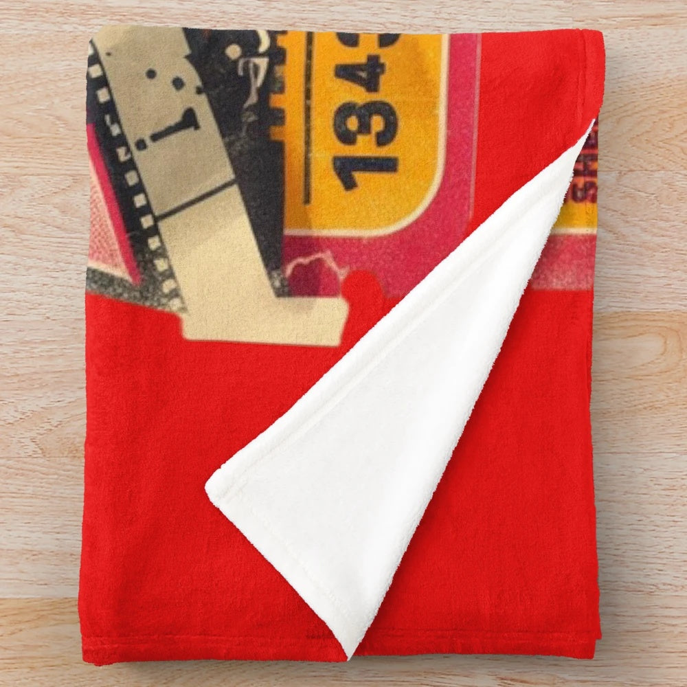Vintage cinema ticket-inspired plush blanket with retro movie poster design