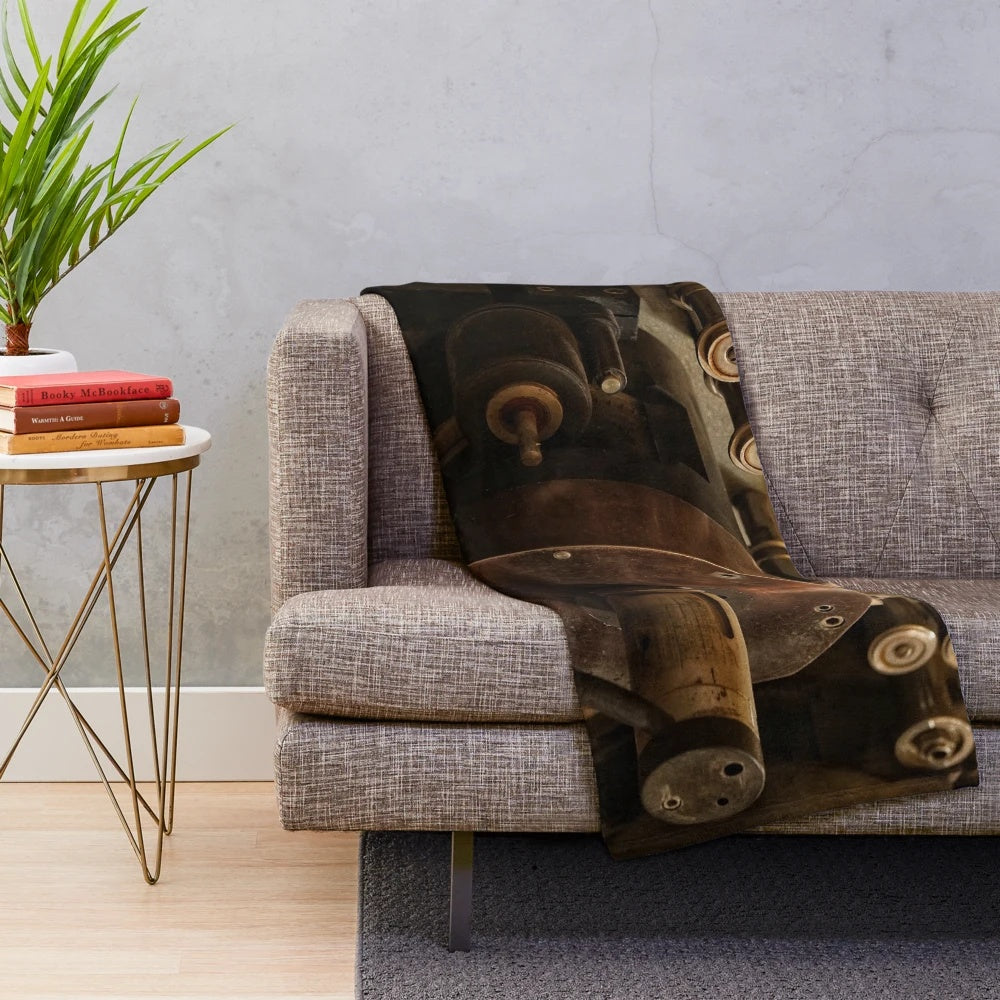 Vintage cinema-themed plush blanket with retro camera and movie theater elements