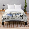 Plush blanket featuring a vintage cinema montage design