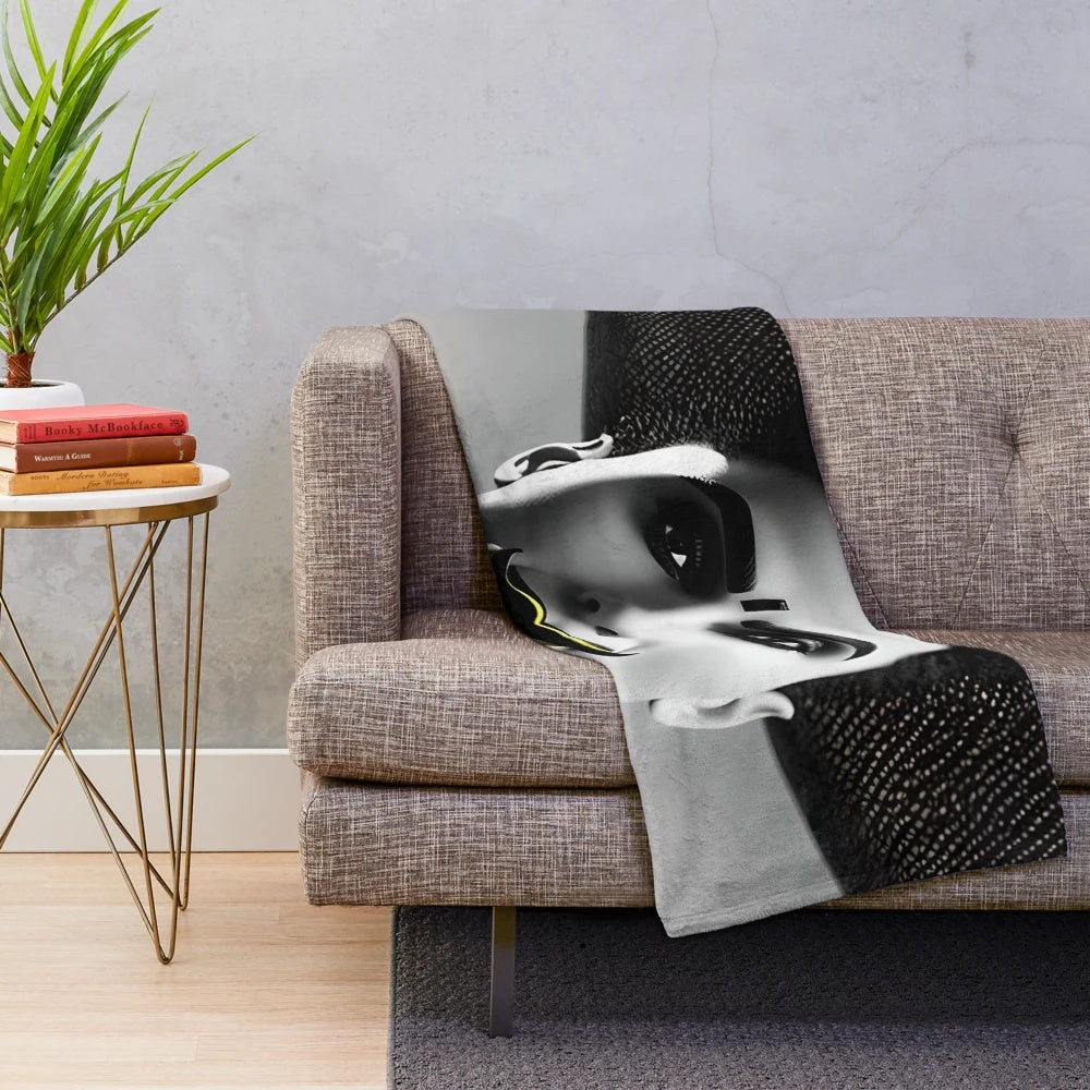 Cozy plush blanket featuring a classic cinema inspired design