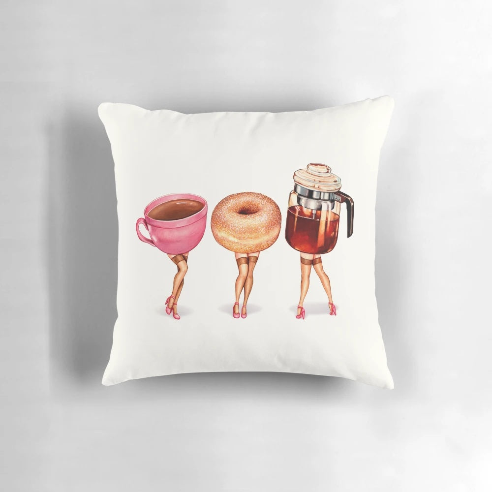 Vintage-style coffee and donut pin-up print on a plush, decorative throw pillow