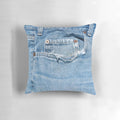 Vintage denim pillow with a distressed old blue jeans design