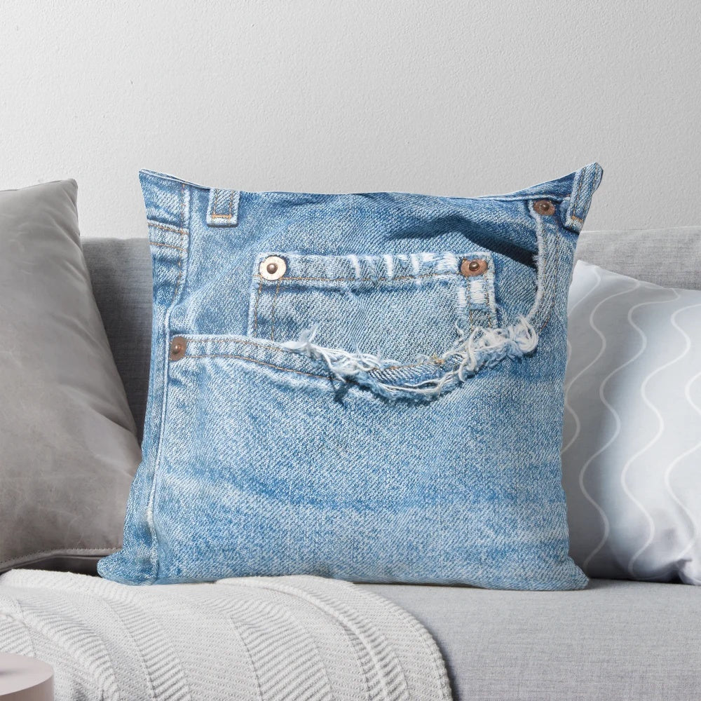 Vintage denim pillow with a distressed old blue jeans design