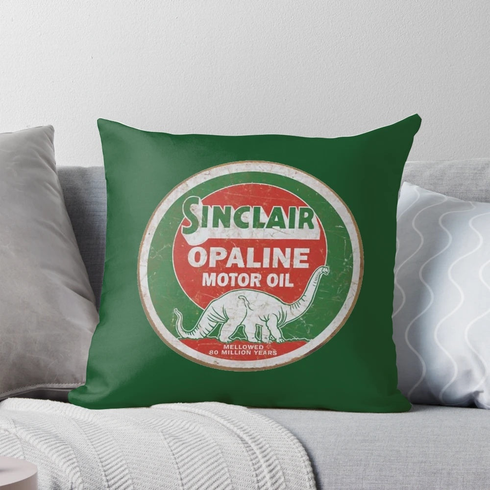 Vintage distressed Sinclair Dino motor oil symbol on a throw pillow