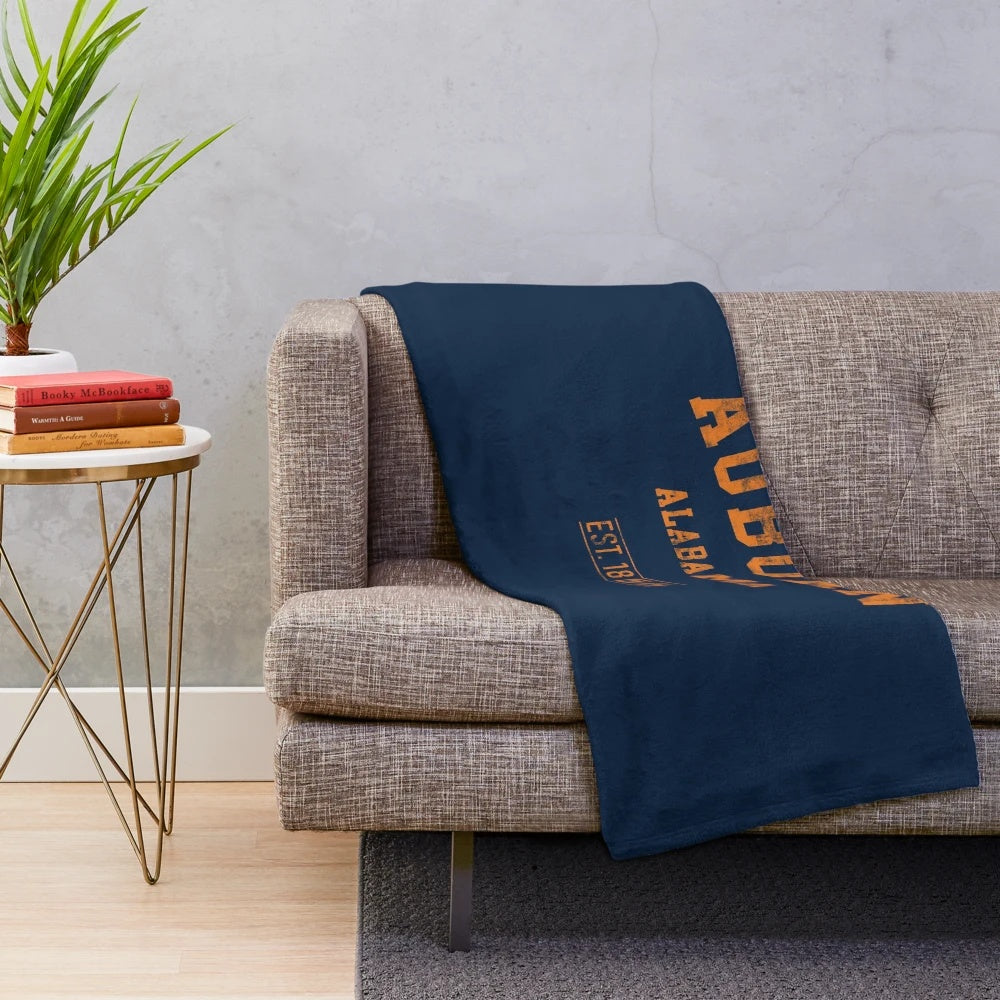 Vintage distressed style plush blanket featuring Auburn Alabama sports team design