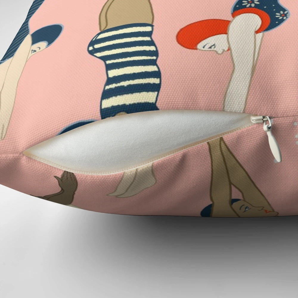 Vintage-inspired pattern of diving ladies in retro swimwear on a pastel floral pillow