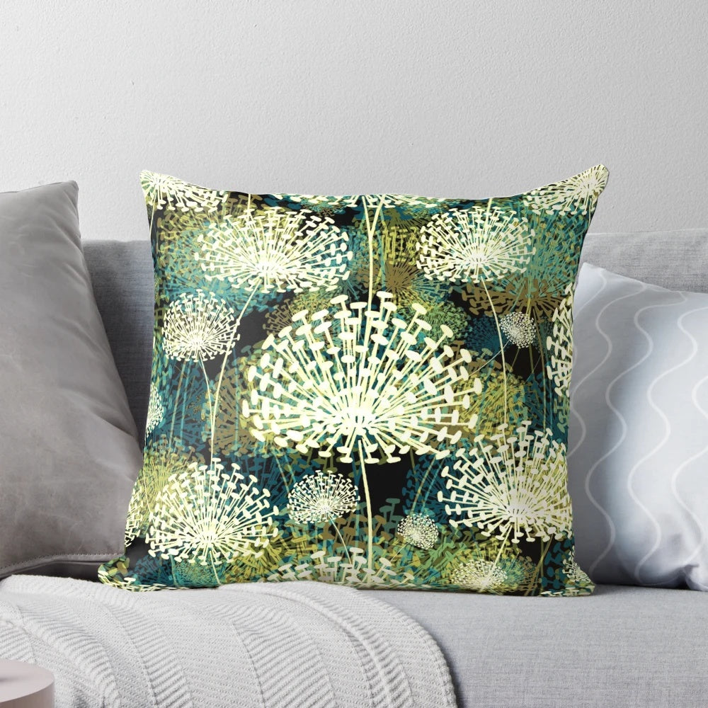 Vintage-style pillow with a whimsical dandelion floral pattern in shades of blue, green, and white.