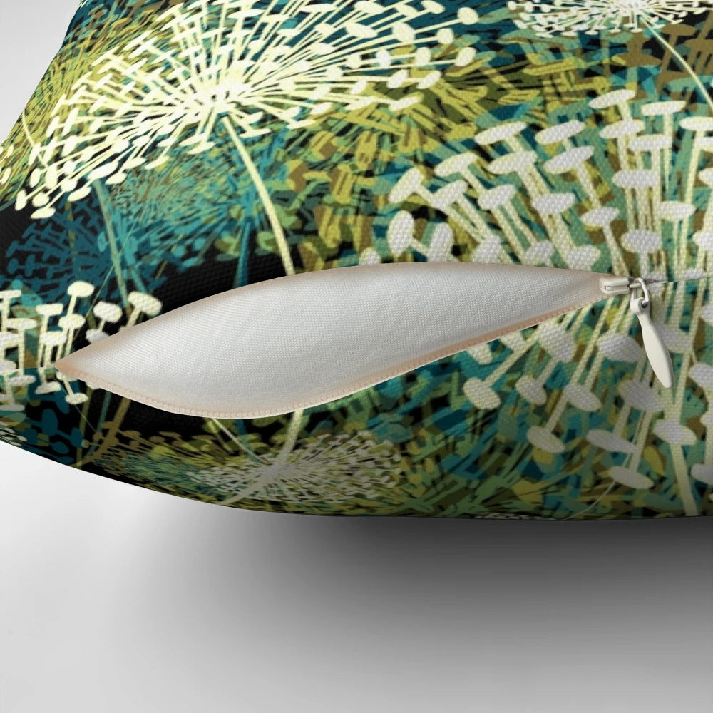 Vintage-style pillow with a whimsical dandelion floral pattern in shades of blue, green, and white.