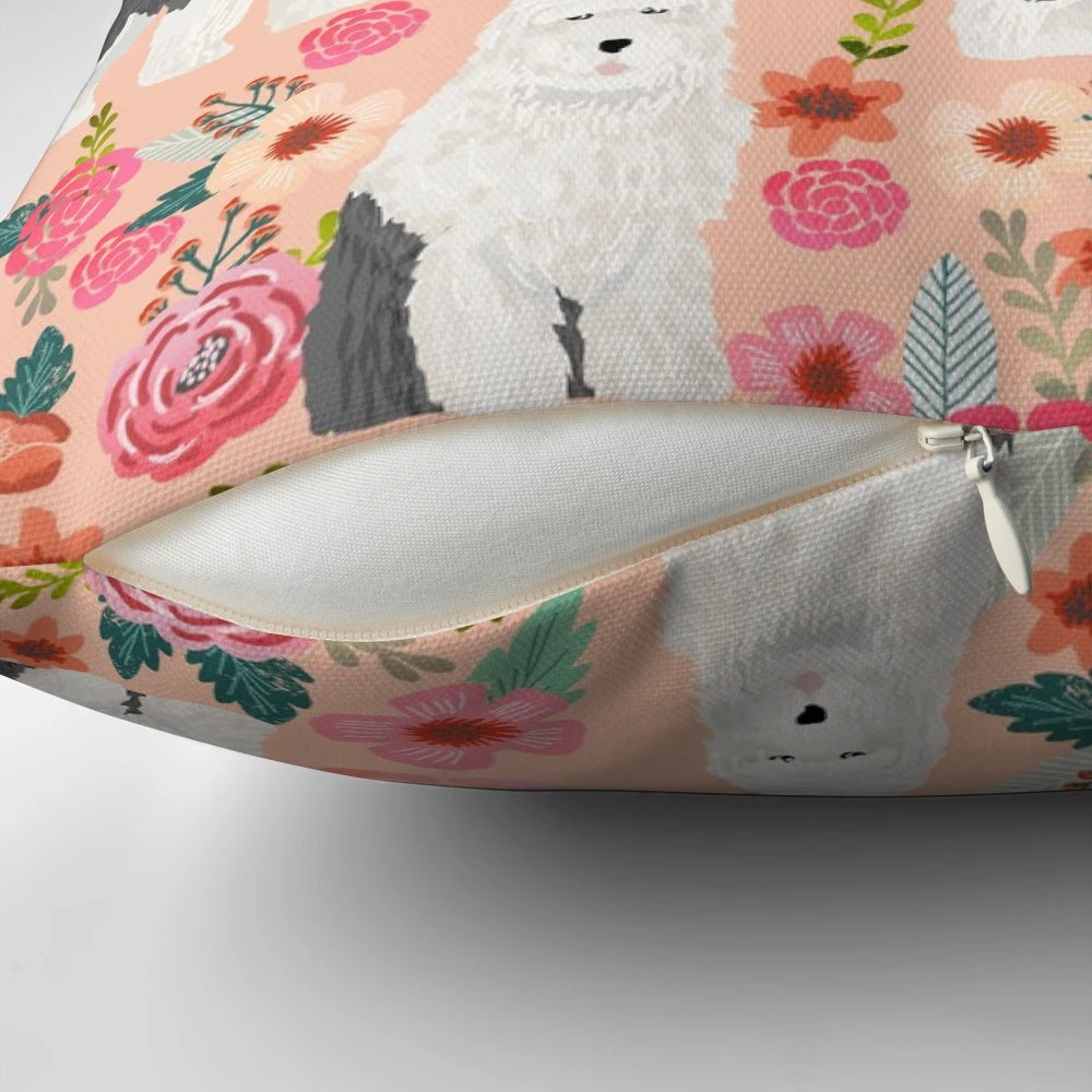 Vintage floral pattern with adorable old English sheepdog dog illustration on a decorative pillow.