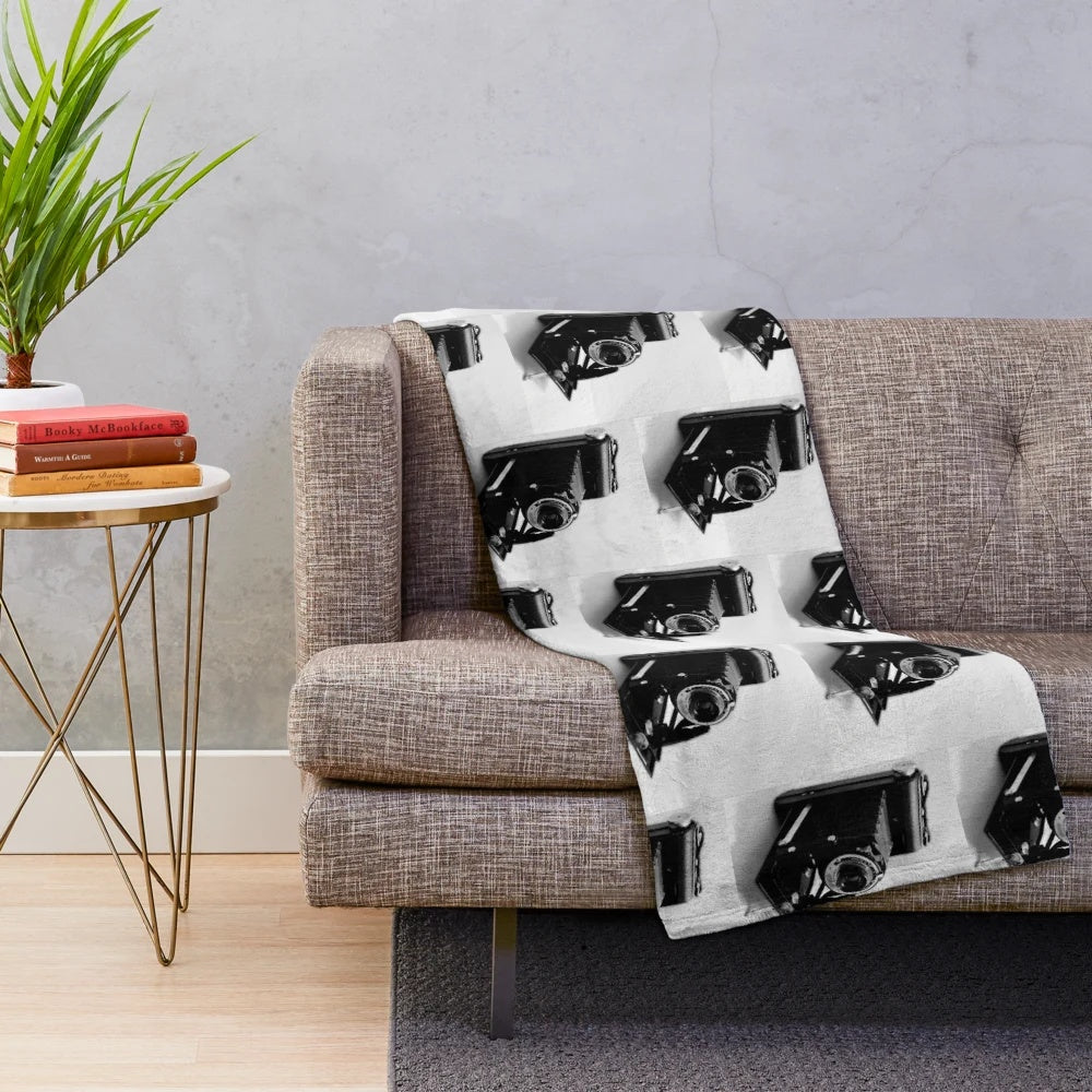 Vintage-style folding camera plush blanket for home decor and cozy comfort