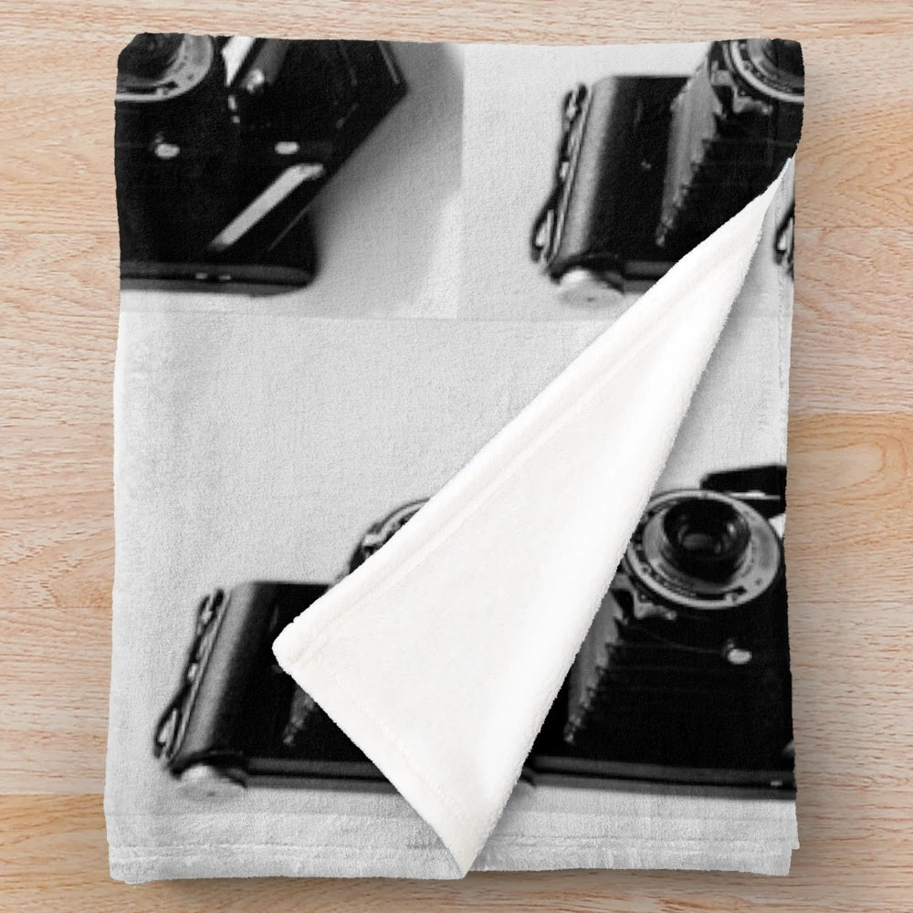 Vintage-style folding camera plush blanket for home decor and cozy comfort