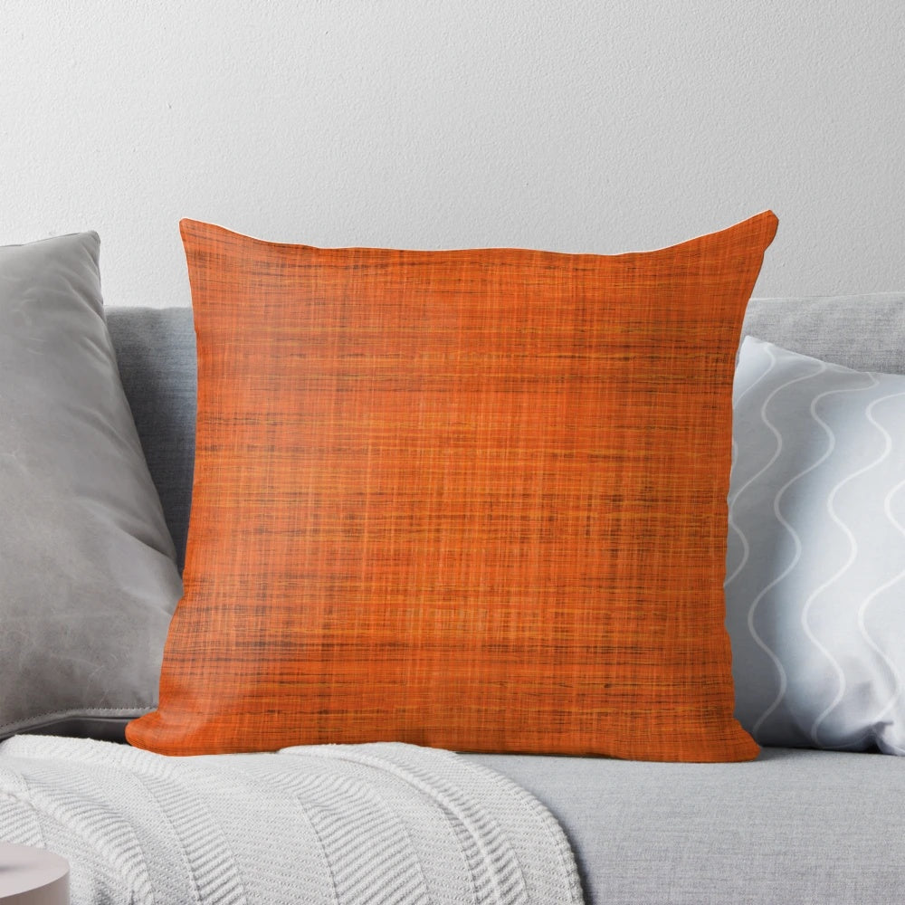 Vintage-inspired orange barkcloth pillow with a retro mid-century modern aesthetic.