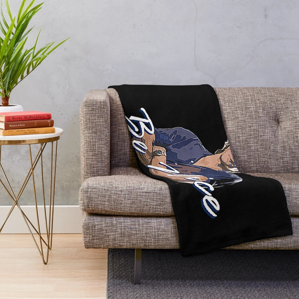 Vintage-inspired plush blanket with "Be Nice" text and 80s movie-inspired design