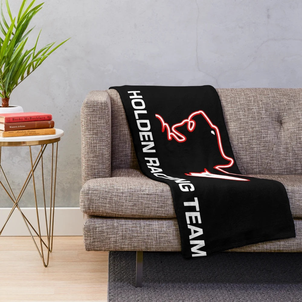 Vintage-inspired black plush blanket with Holden Racing Team design