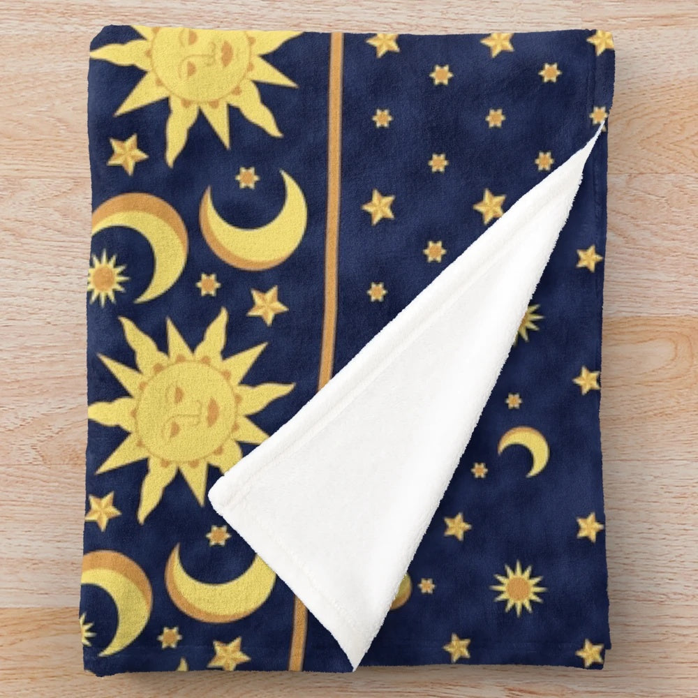 Vintage-inspired celestial plush blanket with moon, stars, and 90s-style pattern