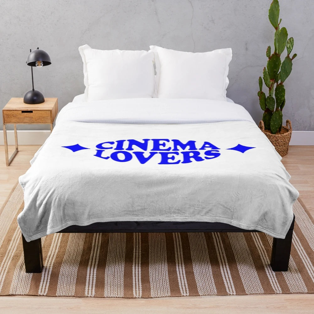Plush blanket with retro graphic hand lettering and vintage typography for cinema lovers
