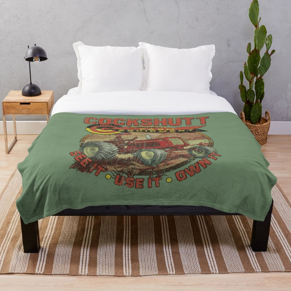 Vintage Cockshutt farm equipment plush blanket with tractor and farming imagery