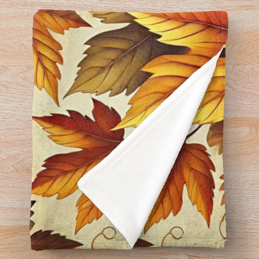 Vintage-inspired plush blanket featuring a detailed, realistic fall leaves design