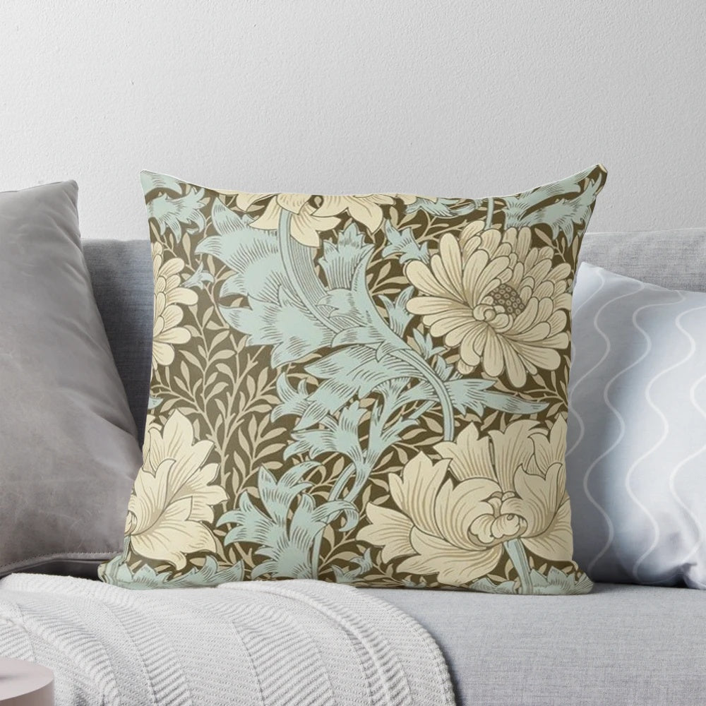Vintage-inspired floral art pillow featuring a botanical pattern inspired by the iconic designs of William Morris