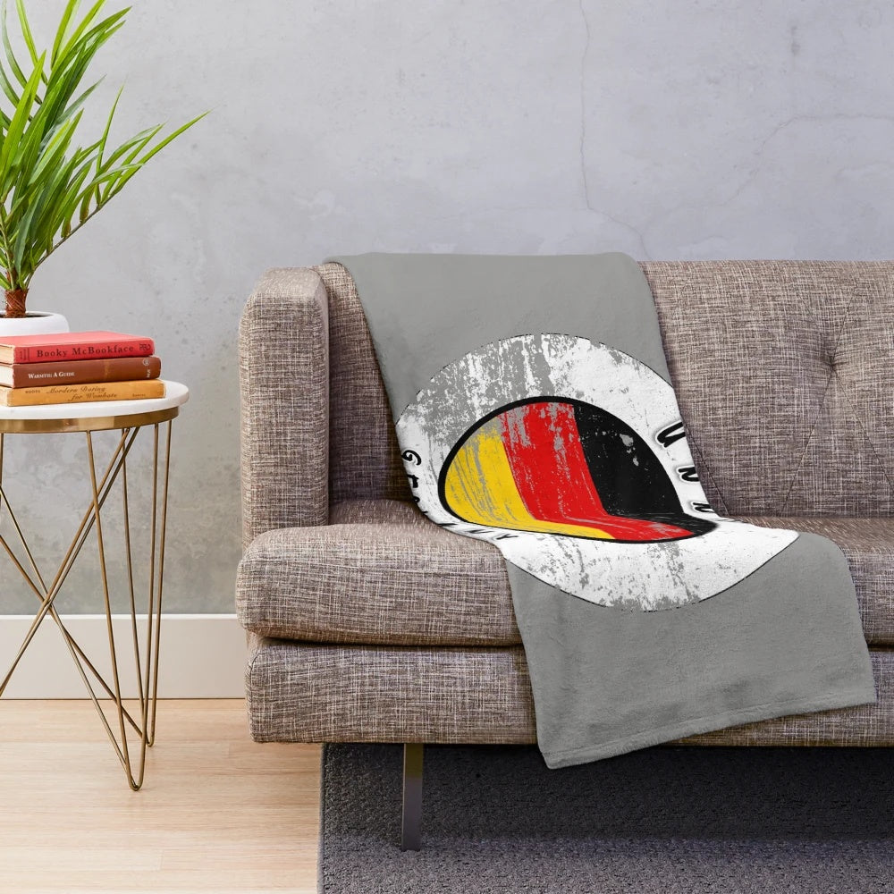 Vintage-inspired plush blanket featuring the German flag