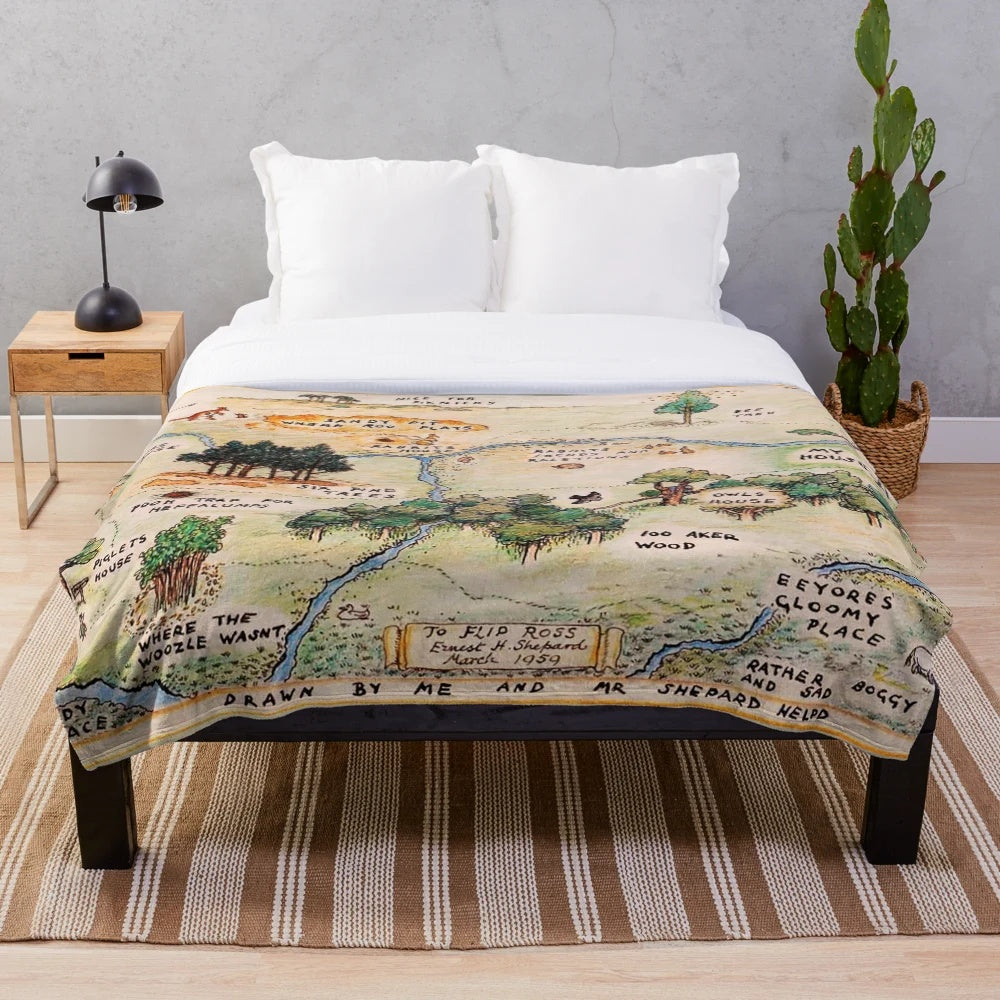 Vintage-inspired Hundred Acre Wood map plush blanket featuring Winnie the Pooh inspired artwork