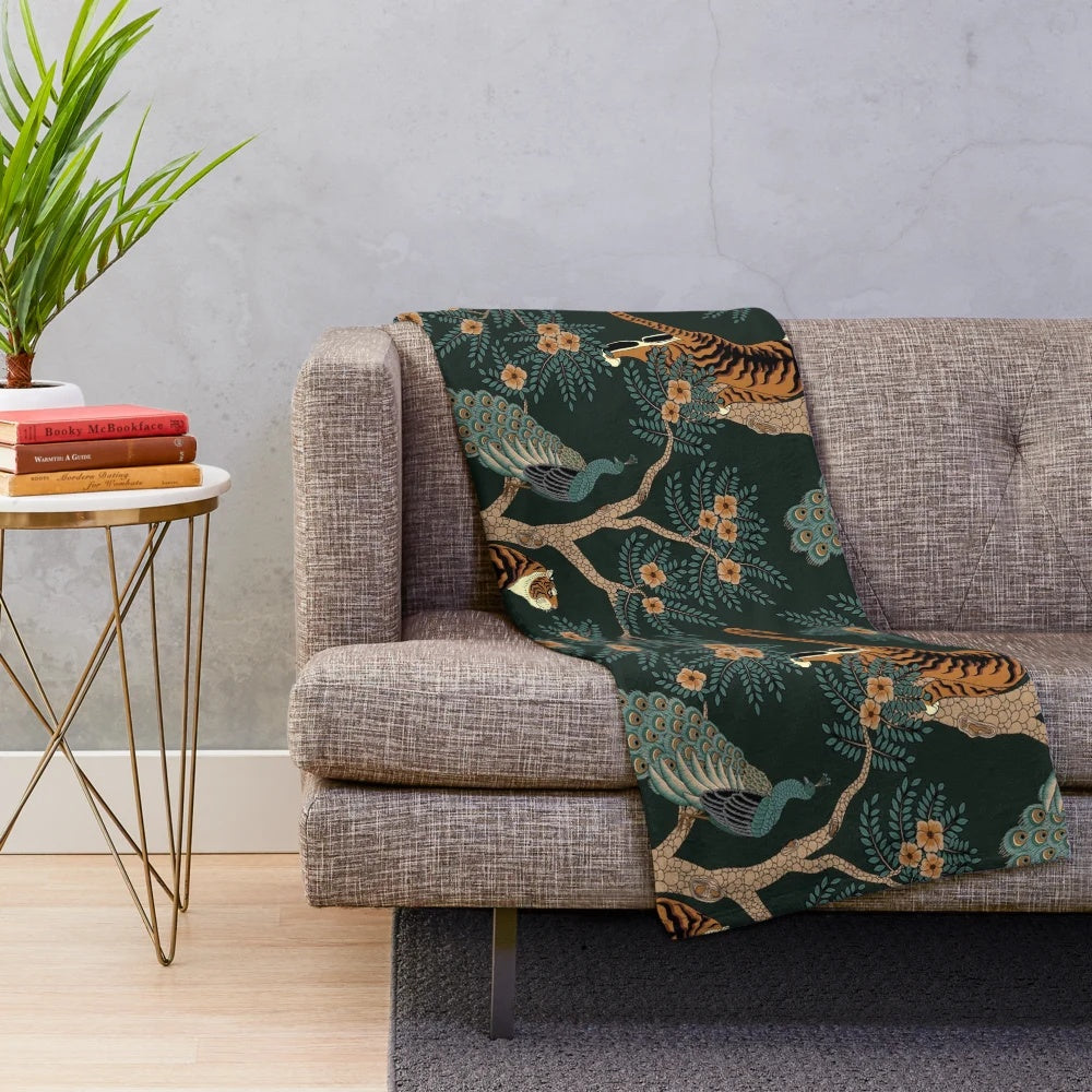 Vintage-styled plush blanket featuring a tiger and peacock in a lush jungle setting