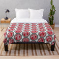 Vintage-inspired MG logo plush blanket for classic car enthusiasts